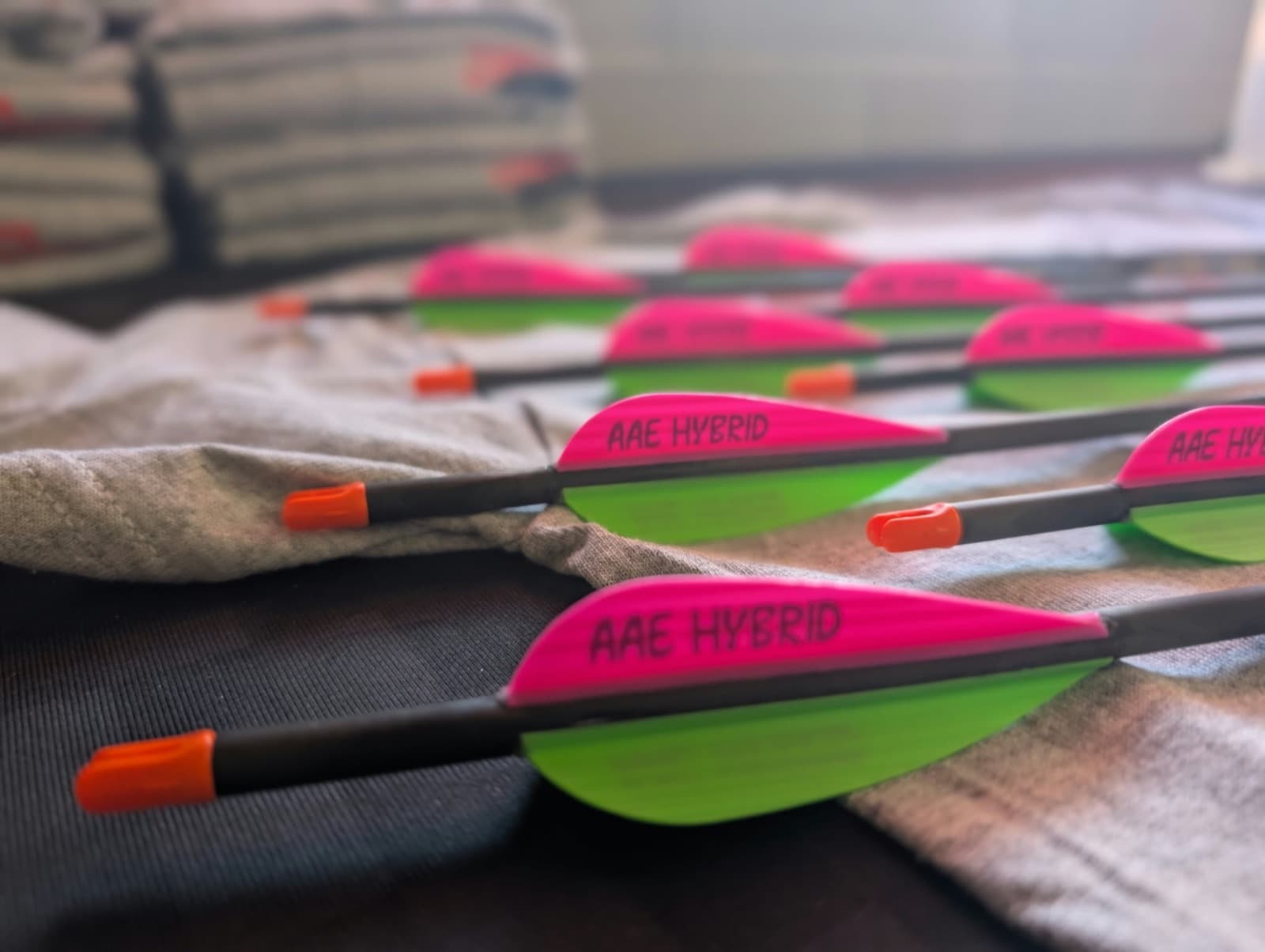Finished custom arrows with pink and green AAE Hybrid vanes